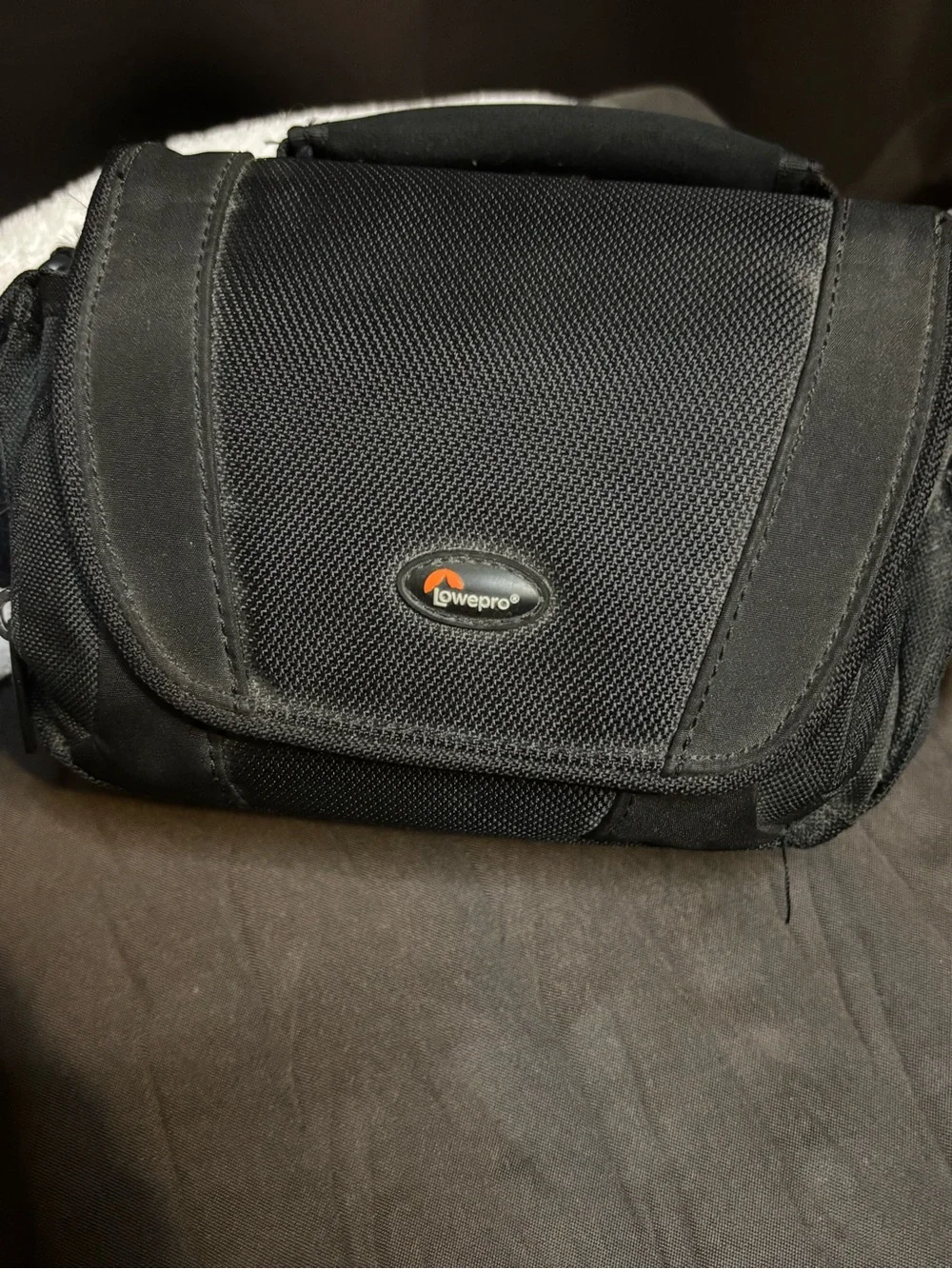 Lowepro Black Camera Shoulder Bag with Compact Holster and a free bag.